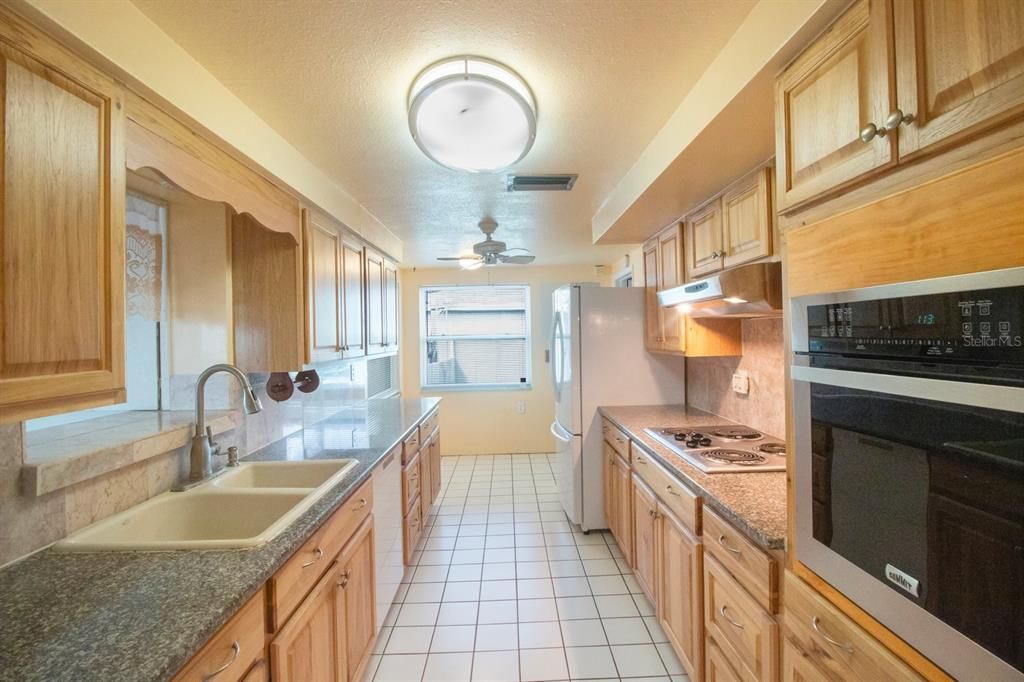 Granite Countertops & Wood Cabinets