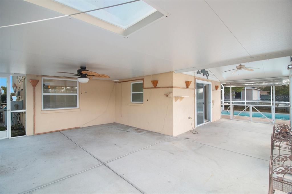 Large patio is connects to the pool area