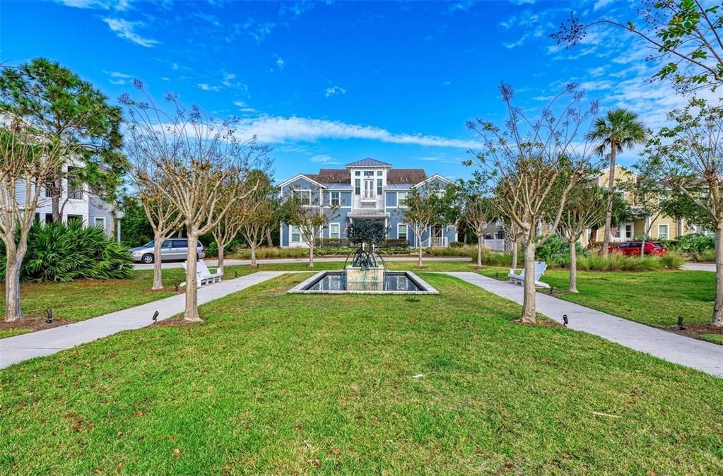 This Stunning Home has an amazing entry in front of the Mangrove Fountain Park!