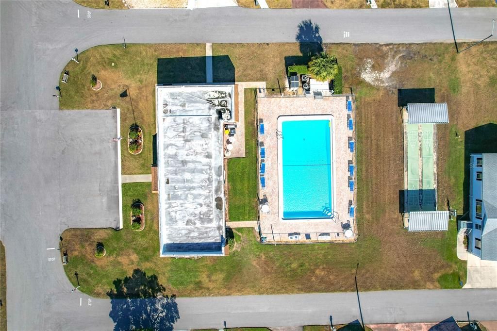 aerial of the clubhouse, pool and shufflebaord