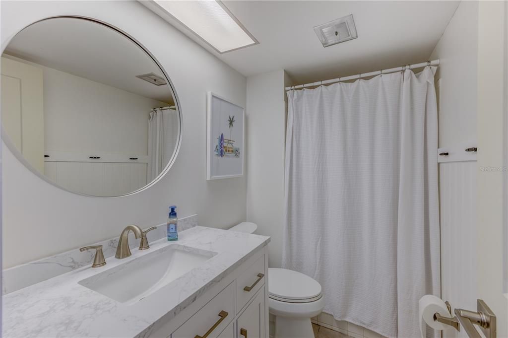 UPDATED SECONDARY BATHROOM WITH WALK-IN SHOWER