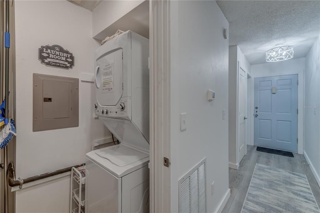 INDOOR LAUNDRY ROOM WITH NEW WASHER/DRYER