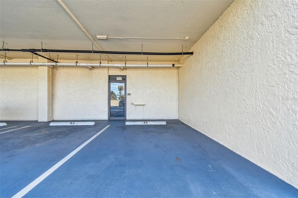 Covered parking space on same level as condo included