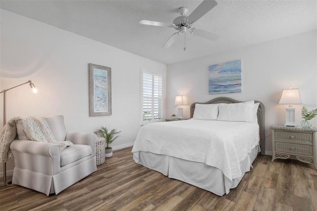 Primary bedroom with ensuite bath and walk in closet