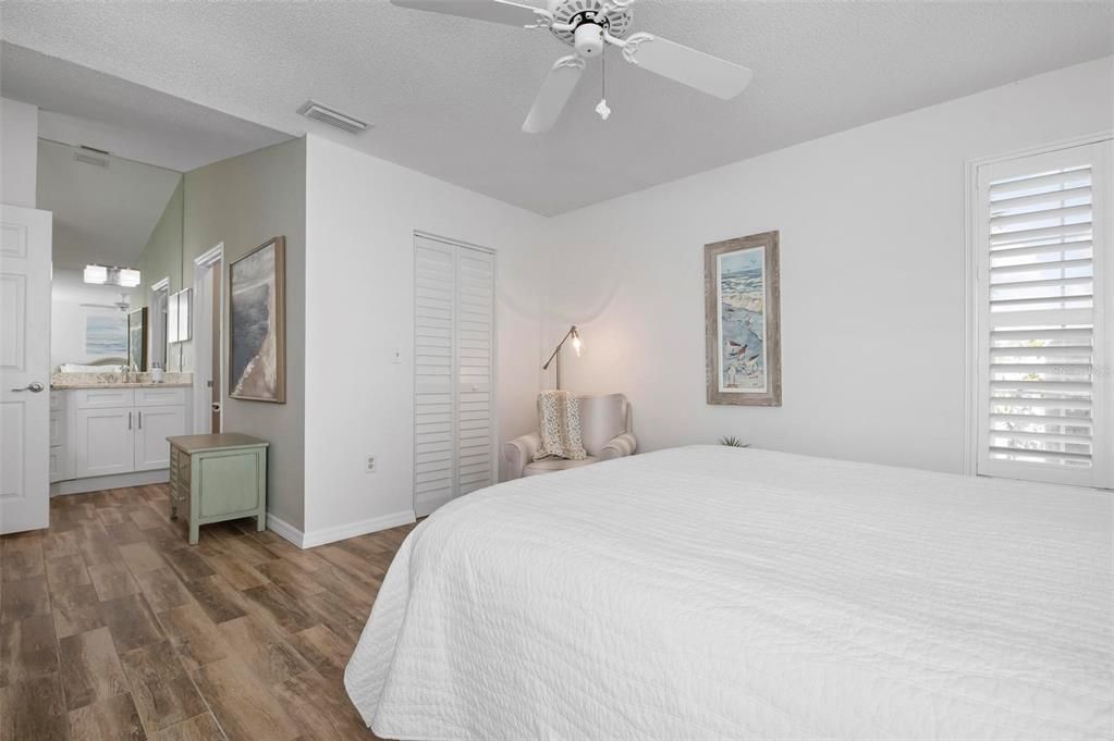 Primary bedroom with ensuite bath and walk in closet