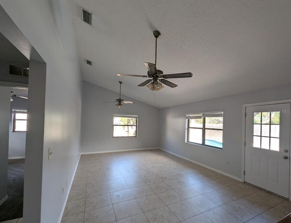 Family room with access to pool