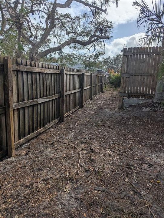 Side  of house with full fencing