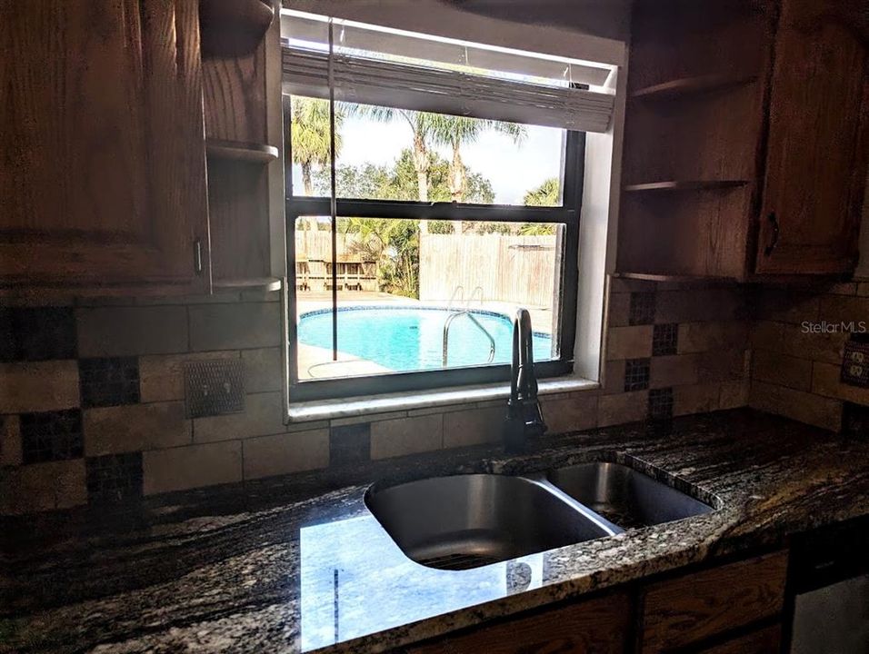 View of pool from kitchen