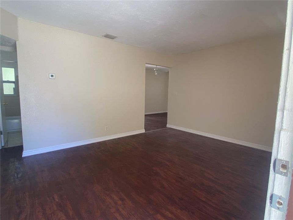 Living room view towards kitchen area