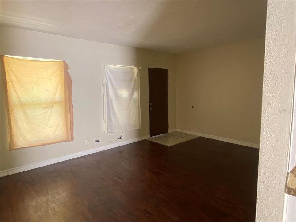 Living room, view from kitchen entrance ( but new blinds have been installed)