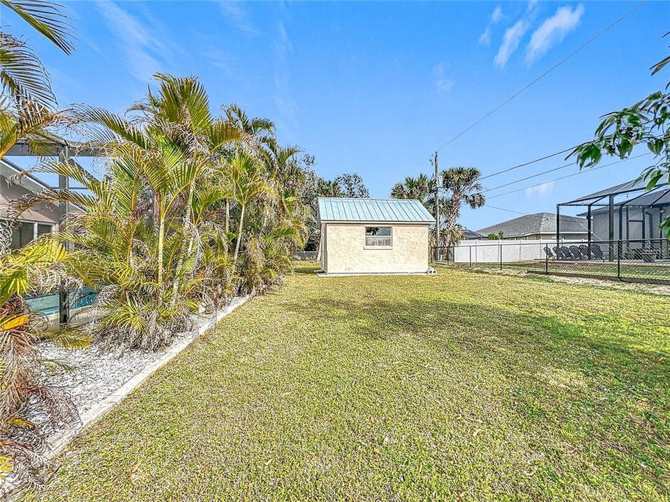 Fenced yard with Shed