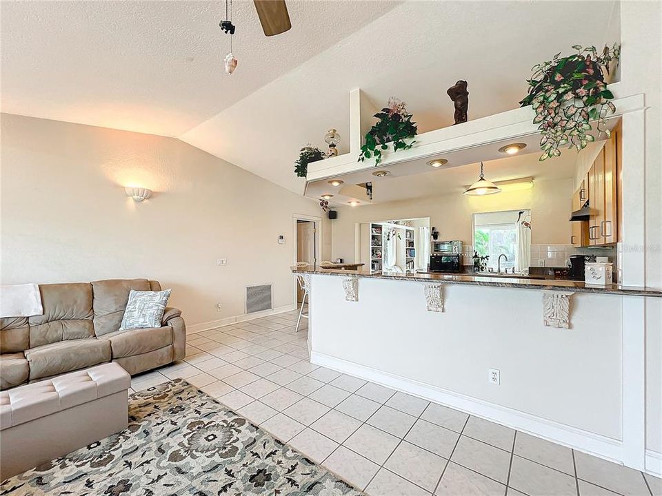 Open living room into kitchen