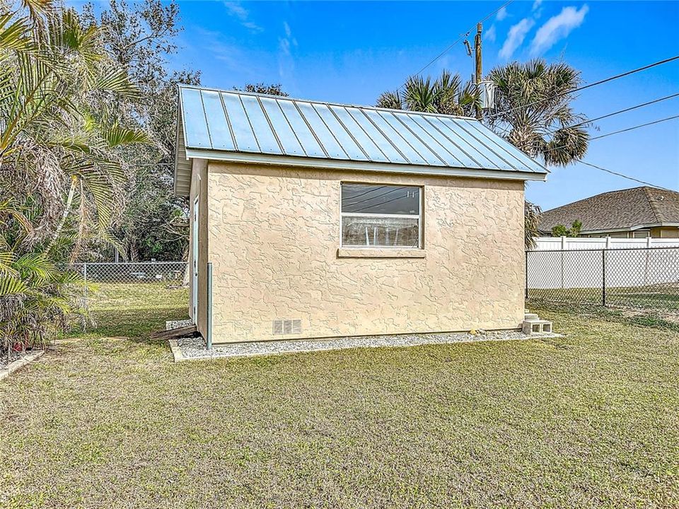 Fenced yard with Shed