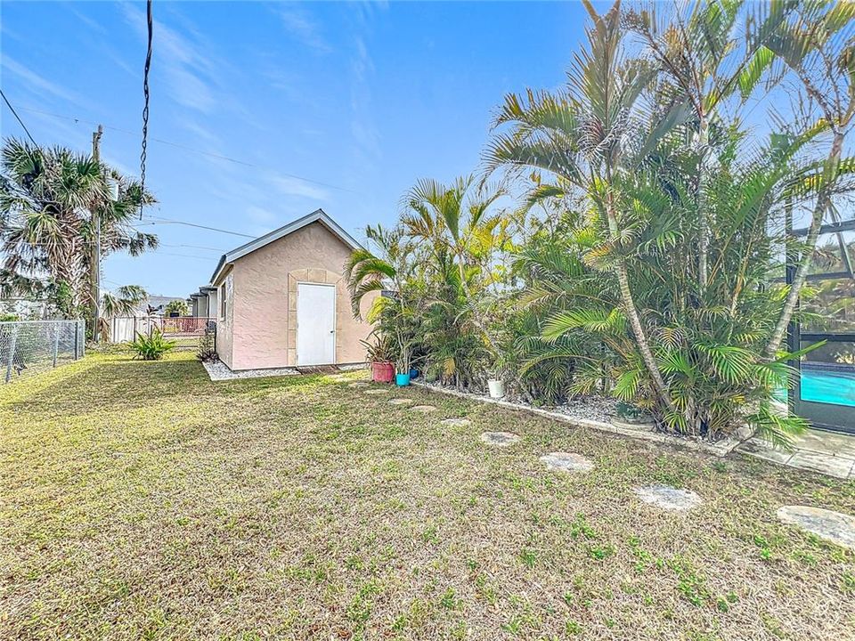 Fenced yard with Shed