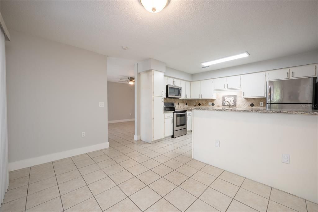 DINING AREA/KITCHEN.