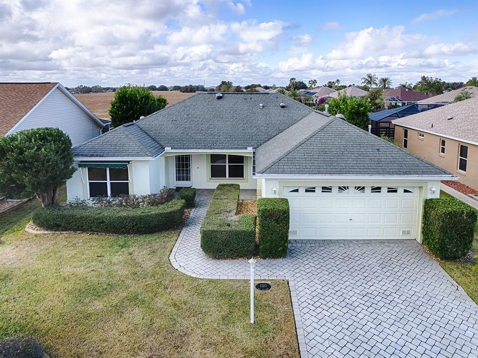 MATURE LANDSCAPING & PAVER DRIVEWAY