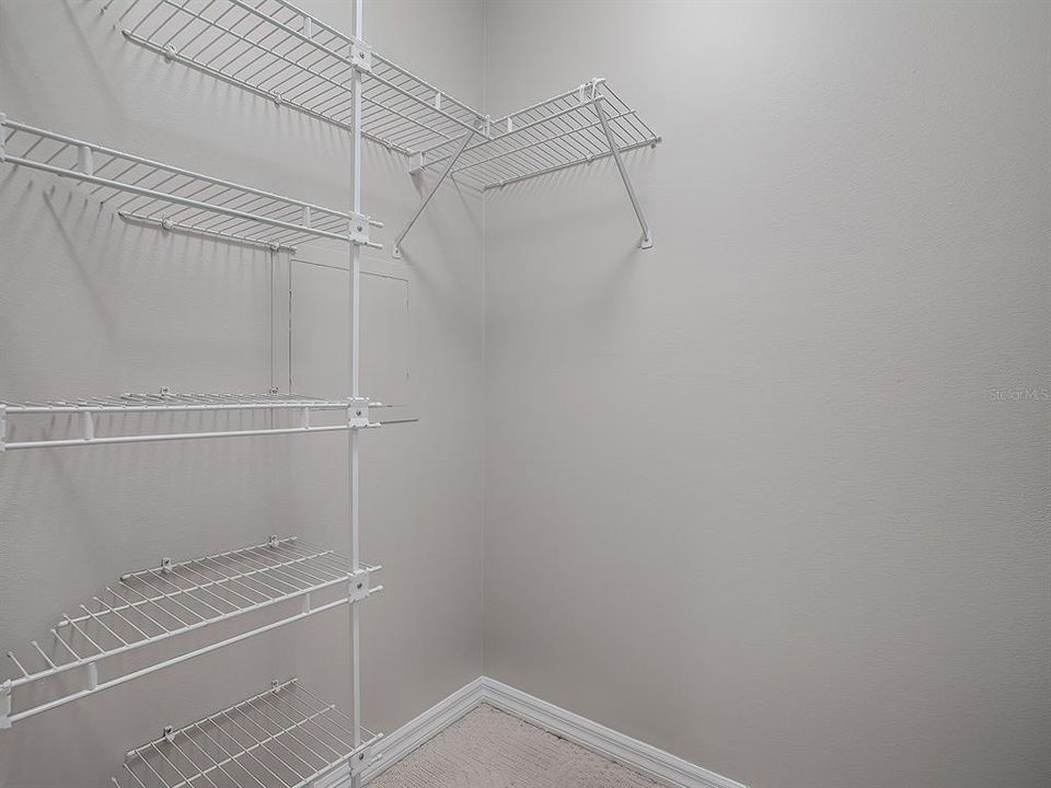 PRIMARY BEDROOM WALK IN CLOSET