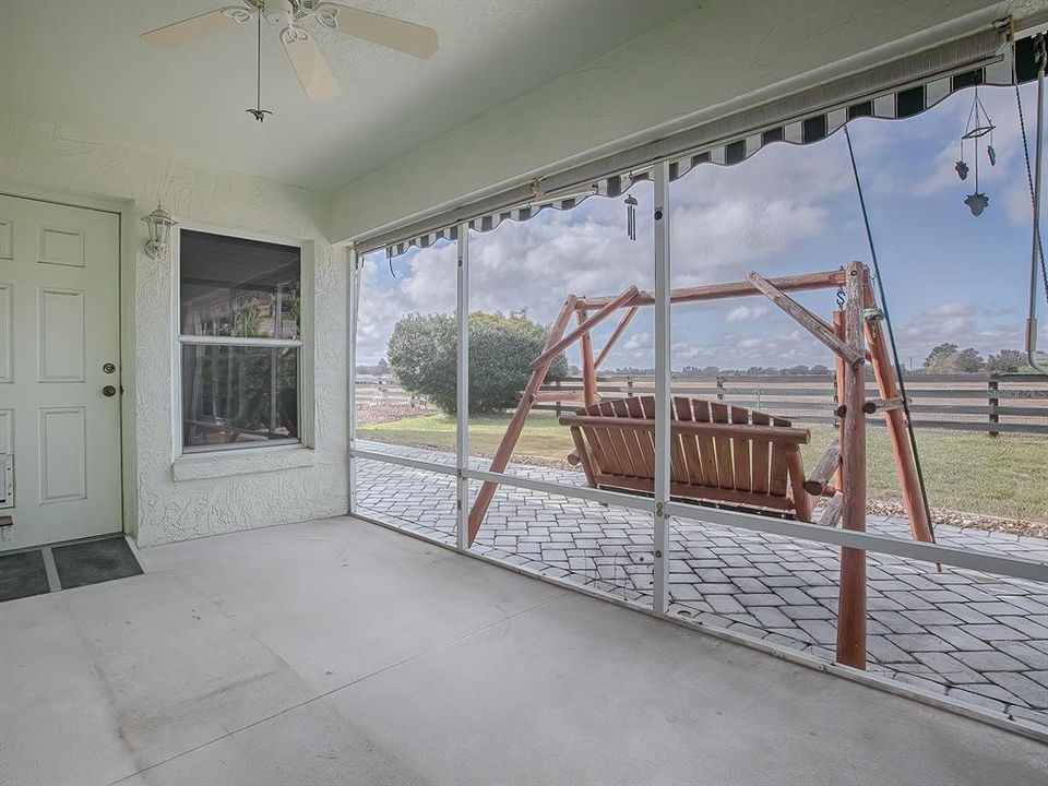 SCREENED LANAI WITH ENTRY DOOR TO THE FLORIDA ROOM