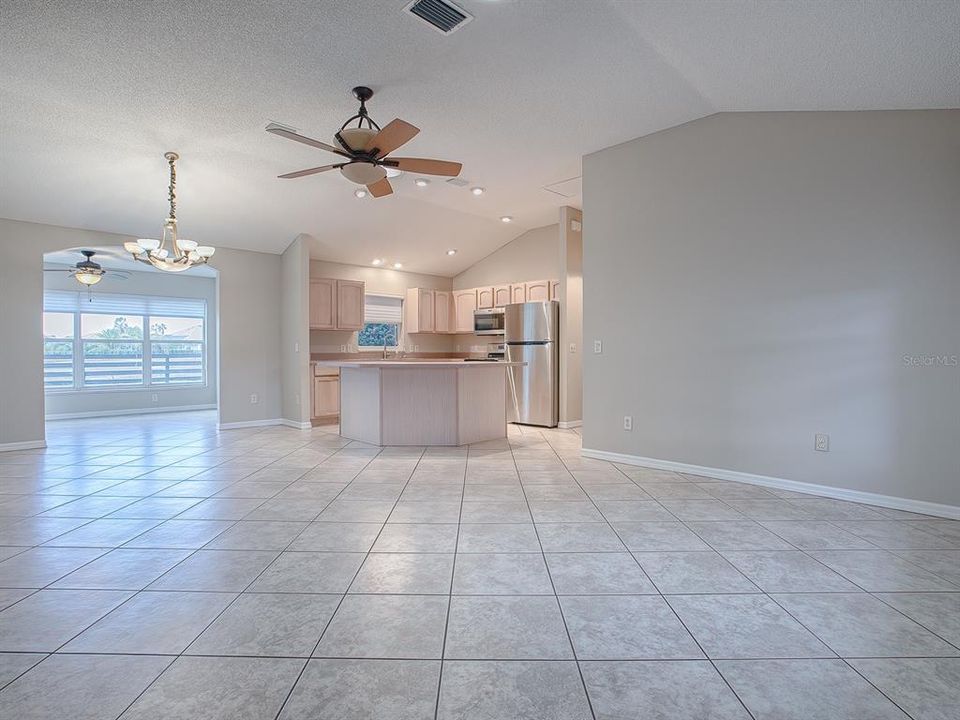 LIVING ROOM WITH VIEW OF KITCHEN & ISLAND