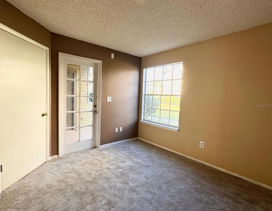 Primary Bedroom with direct access out to the patio!