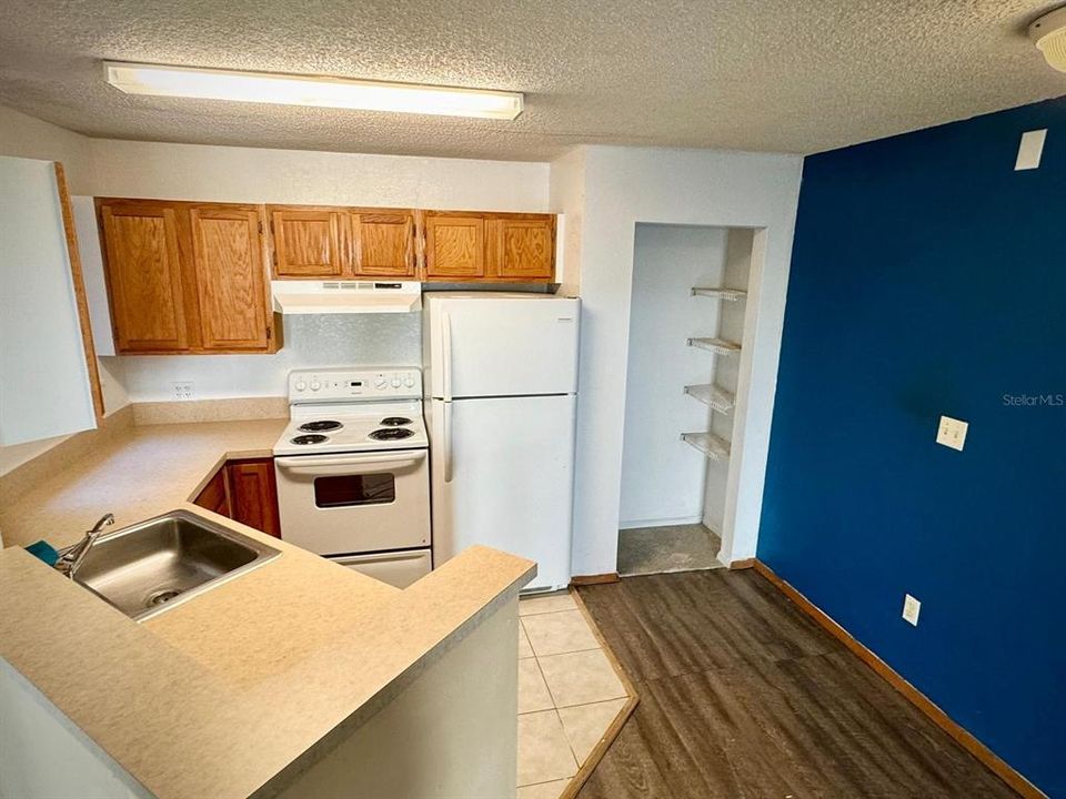 Good sized kitchen with nice, natural light! overlooks the family room!