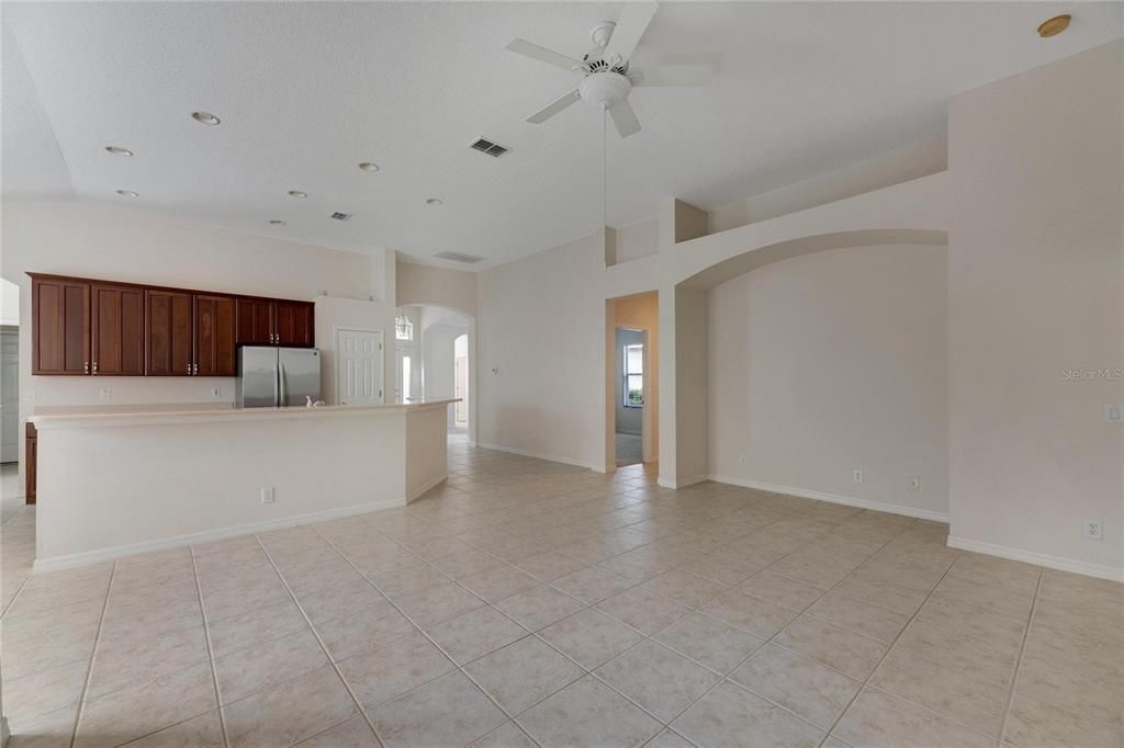 Built in nook and plant shelf in the family room.  Behind this area is bathroom two, and bedroom two and three.  the bathroom is between the two bedrooms.  The bathroom has a step in tub with shower.