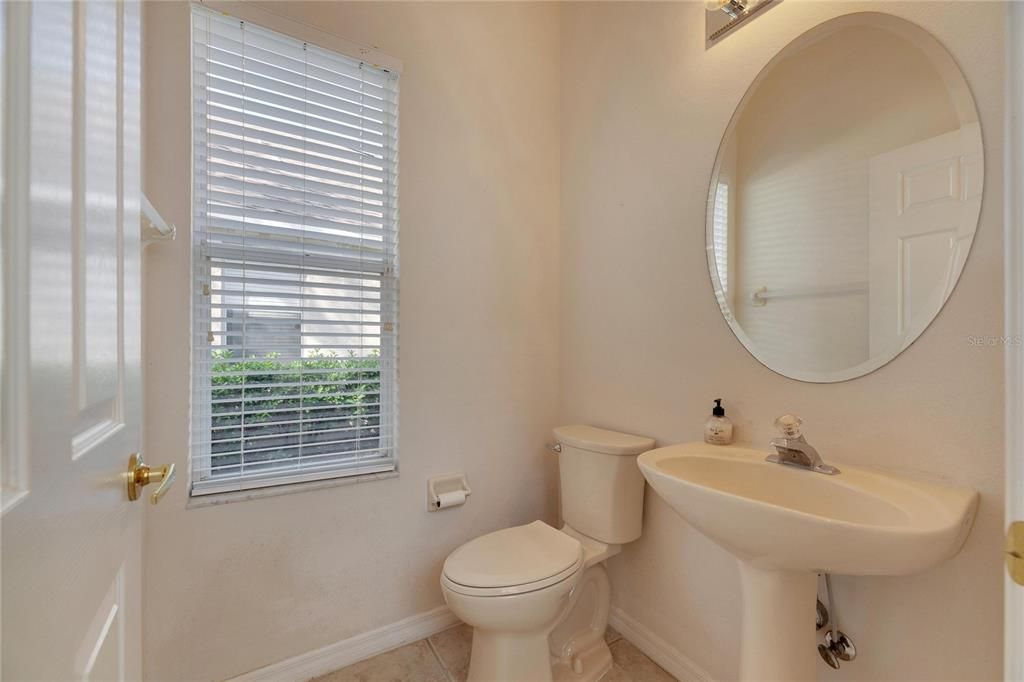 Half bath located between the forth bedroom and living room up at the front of the home.