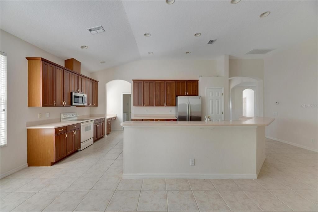 Standing where the kitchen table would be looking into the kitchen.