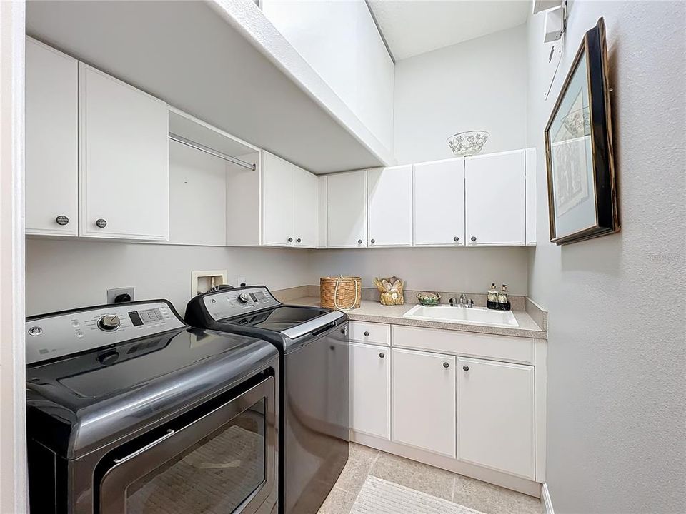 Adjacent Laundry Room with additional storage