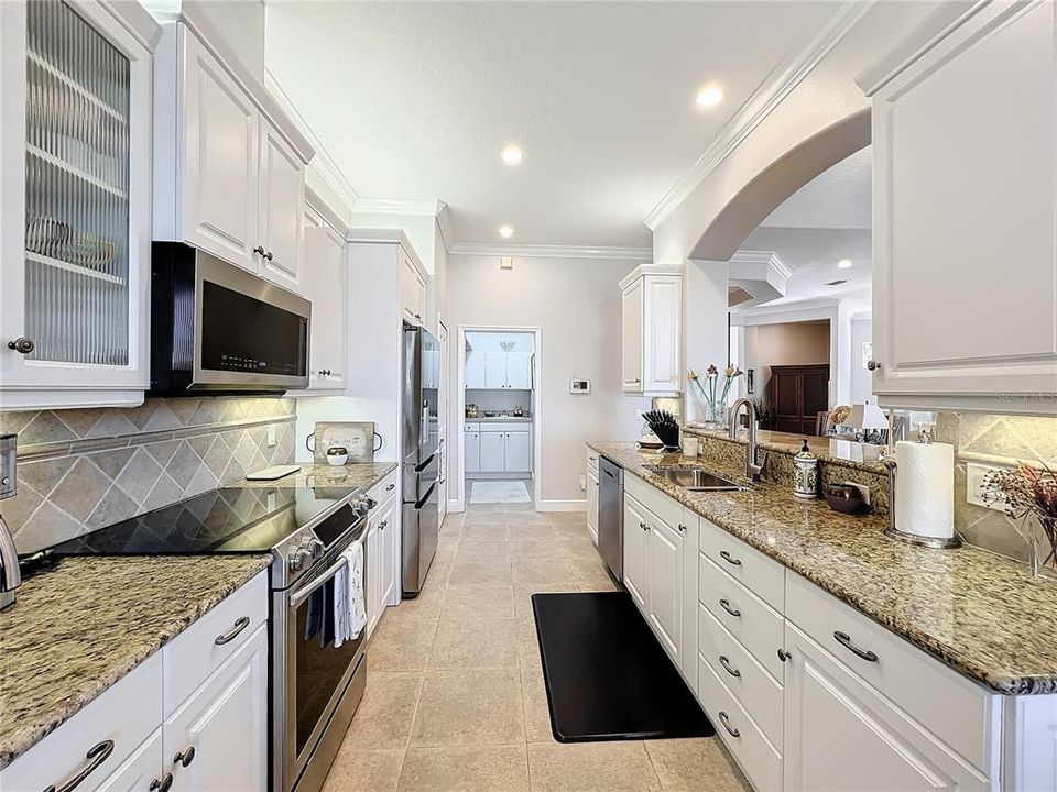 Gourmet Kitchen with white cabinetry