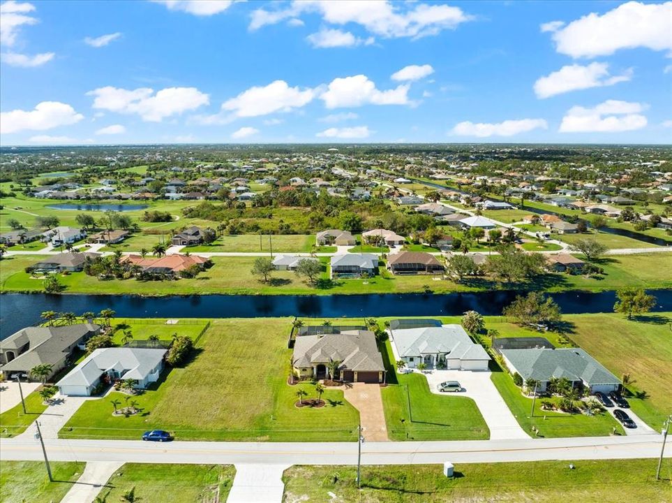 Oversized Waterfront Lot and Canal-fed Irrigation.