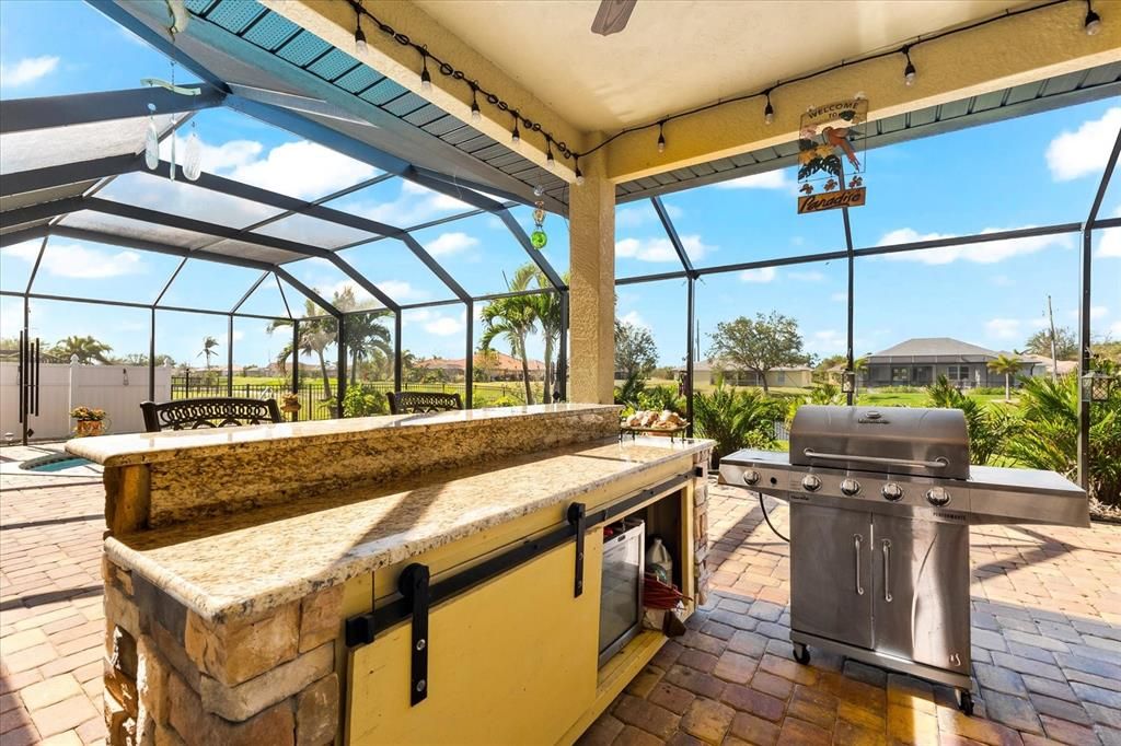 Full Outdoor Kitchen and Bar Area