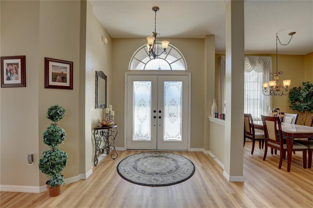 View of front door from living room