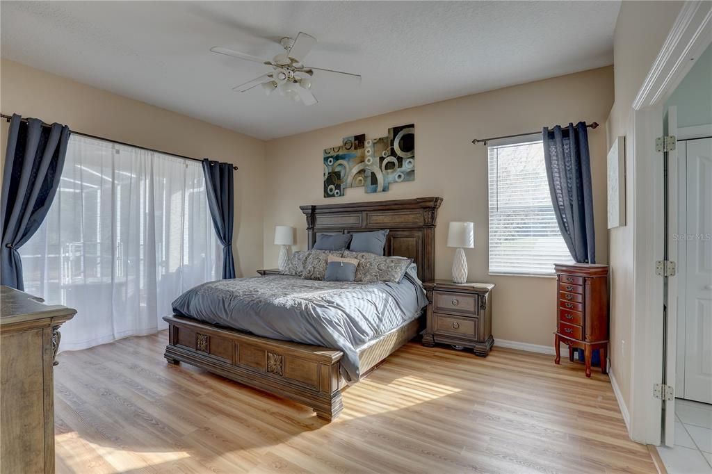 View of master bedroom from front door entrance