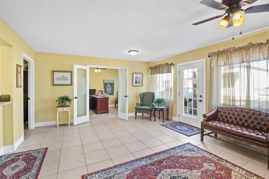 Lobby with view into individual office and board room