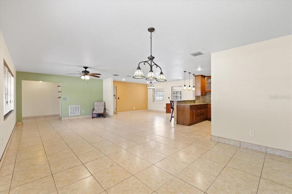 open floor plan living room/dining room and kitchen space