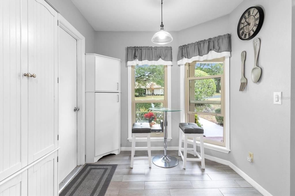 Breakfast Nook in Kitchen..Door on Left goes to Garage