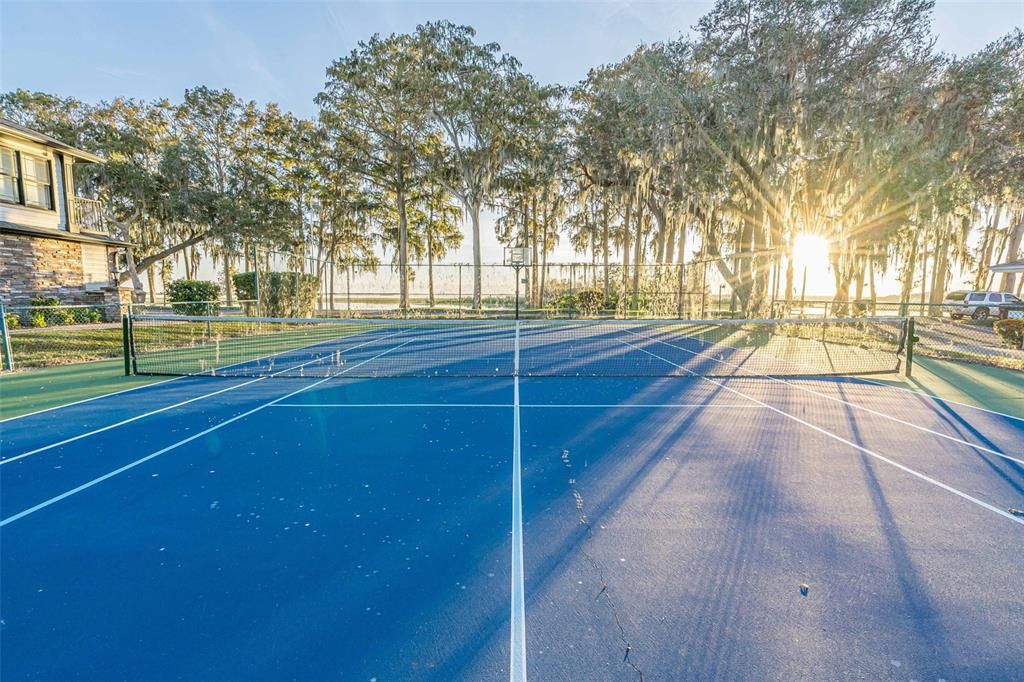 Tennis with a lake view