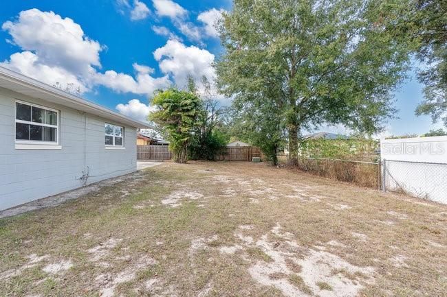 Fenced in yard is perfect for the furry babies in the family