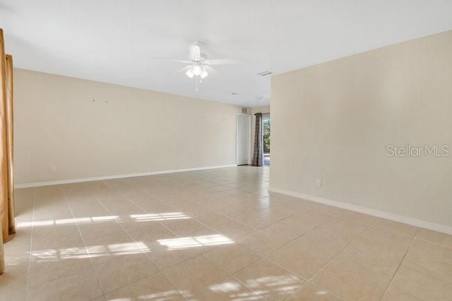 Living room opens to the Dining area and Primary Suite