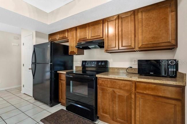 Great cabinet space and a closet pantry on the left