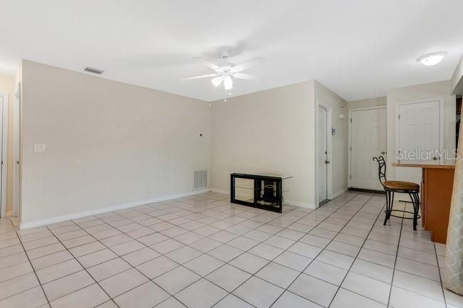 Spacious Family Room is open to the 2 bedrooms, the kitchen and the garage