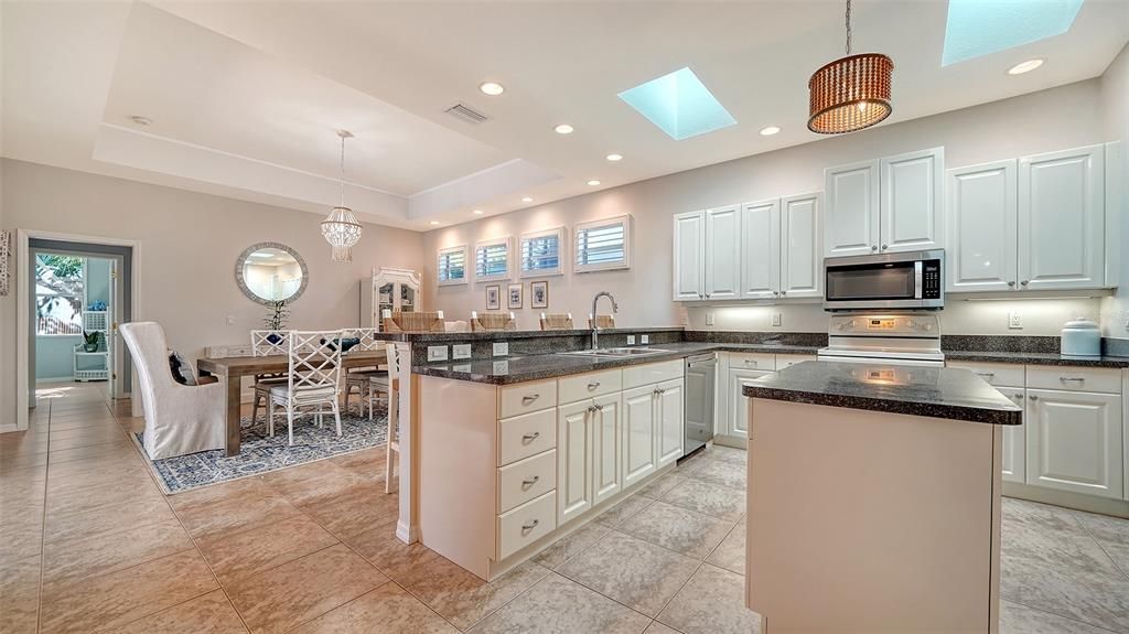 There is an abundance of storage in the kitchen including a pantry!