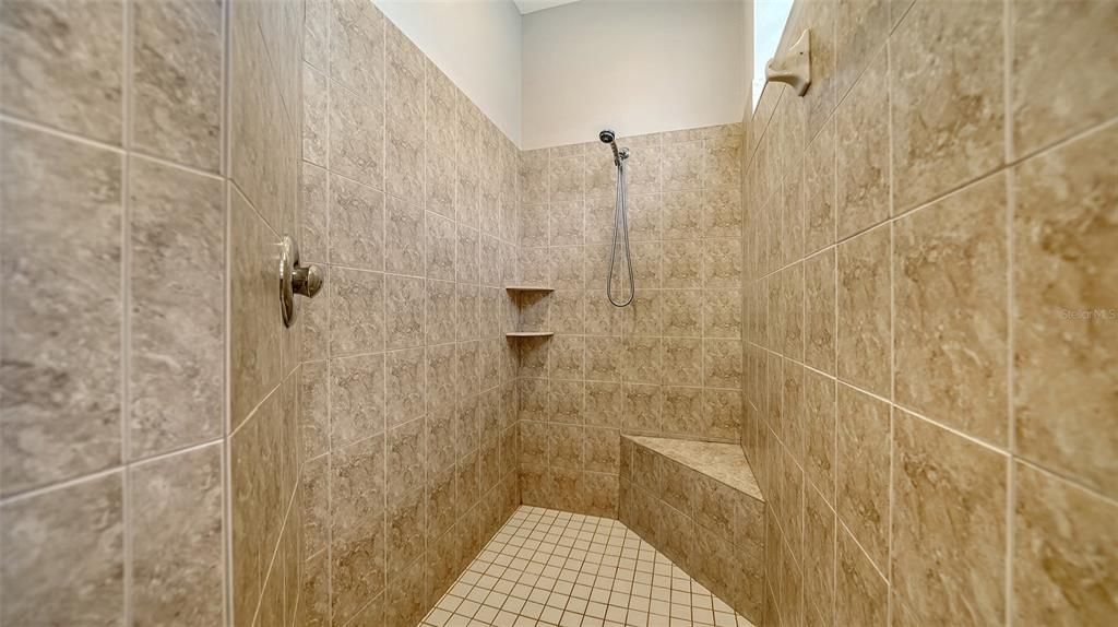 Spa worthy walk in shower with built in bench