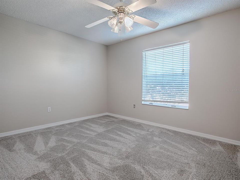 GUEST ROOM 2-NEW CARPET THIS ADDITIONAL GUEST BEDROOM CAN BE USED AS A DEN OR HOME OFFICE