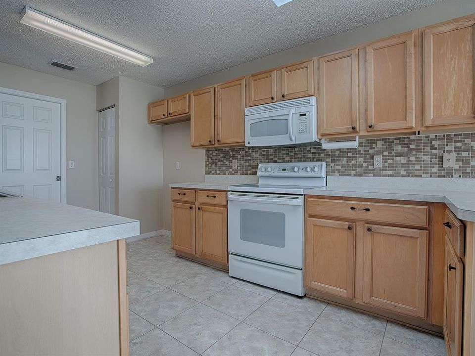 CHECK OUT THAT GORGEOUS TILED, RECENTLY GROUT CLEANING COMPLETED BACKSPLASH!