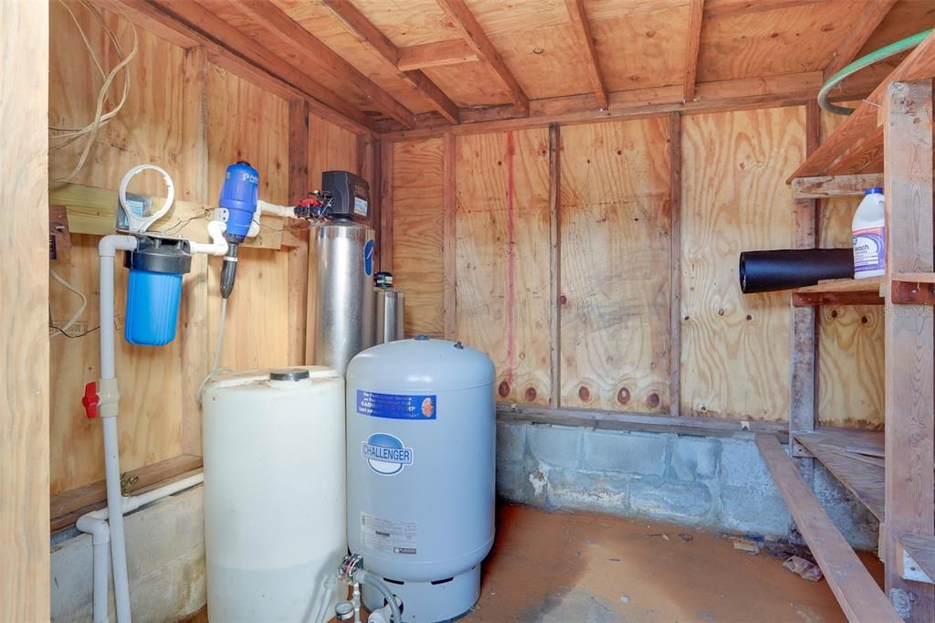 Inside of Shed with Water Pump and Whole House Filteration and Softener System