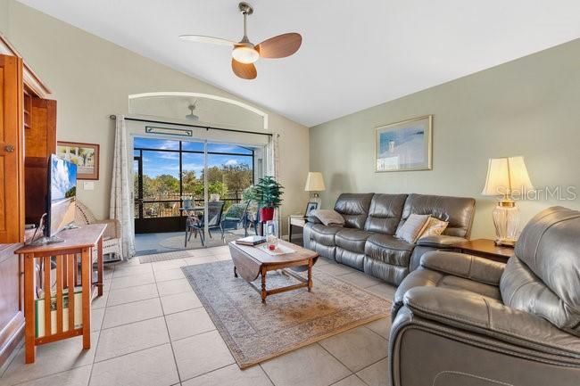 Spacious family room overlooks the outdoor space