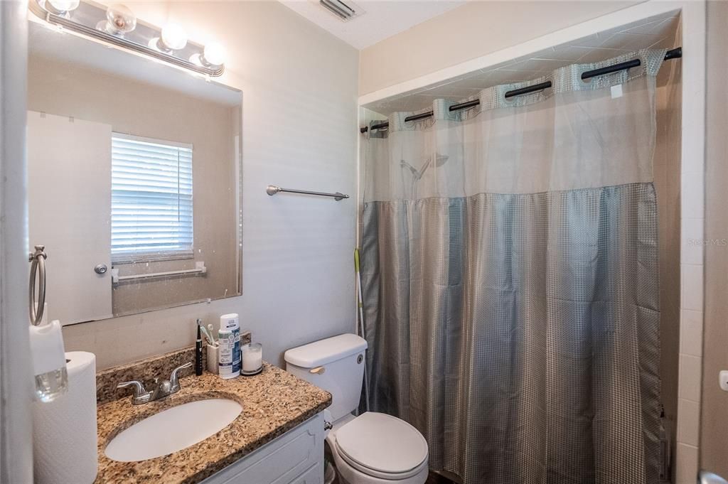 Primary Ensuite Bathroom. Tub w/Shower.