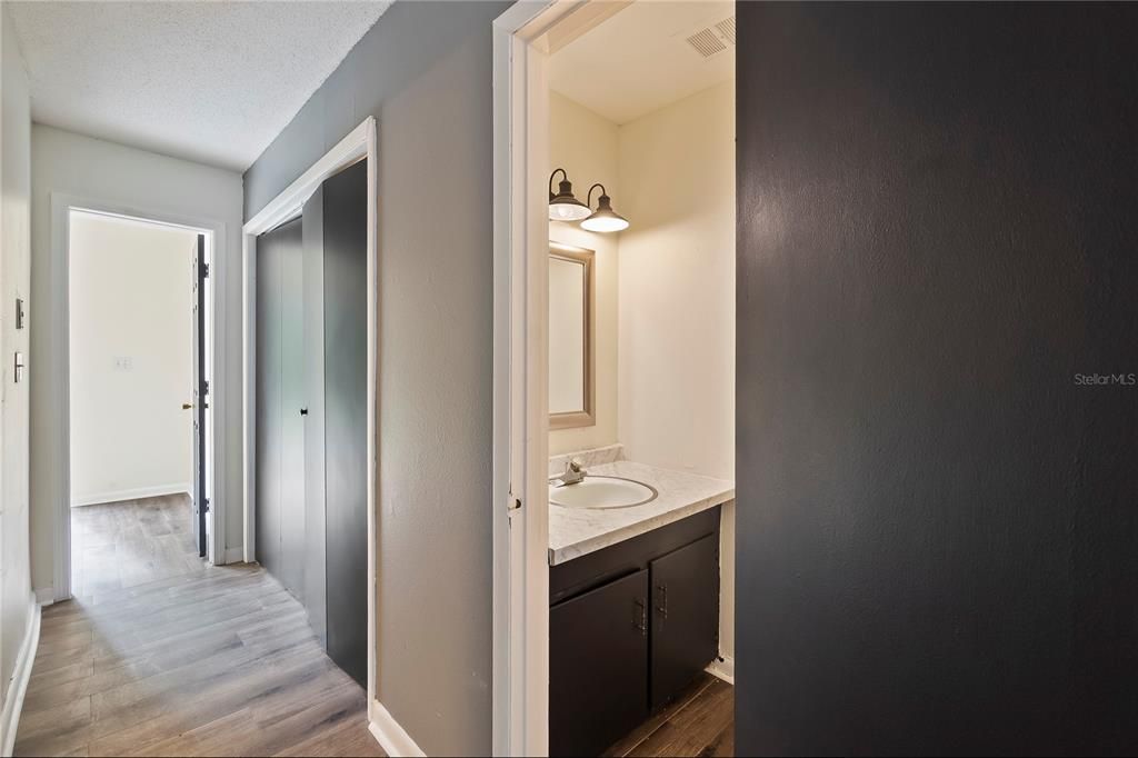 Downstairs hallway and 1/2 bath.